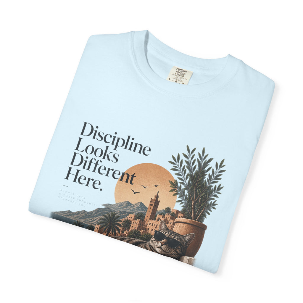T-Shirt — "Discipline Looks Different Here" Sunset Cat Graphic