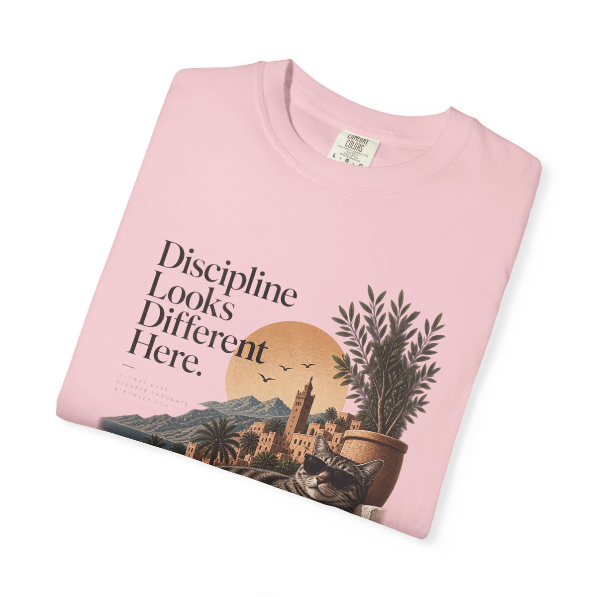 T-Shirt — "Discipline Looks Different Here" Sunset Cat Graphic