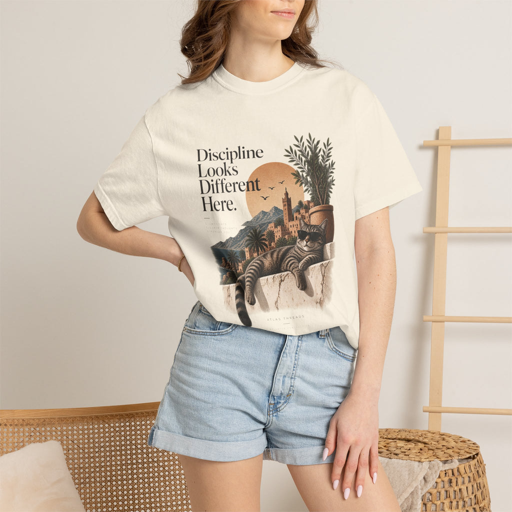 T-Shirt — "Discipline Looks Different Here" Sunset Cat Graphic