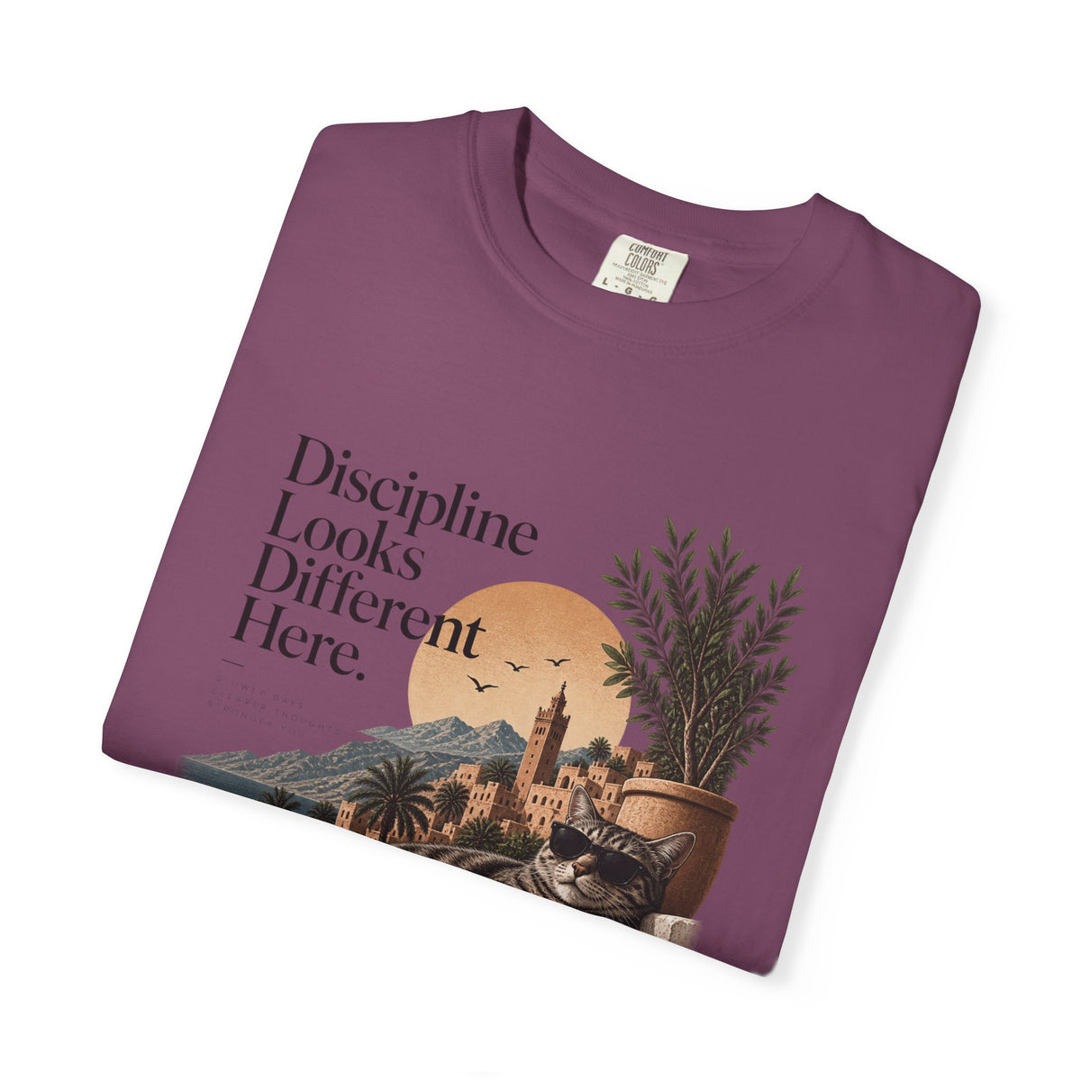 T-Shirt — "Discipline Looks Different Here" Sunset Cat Graphic